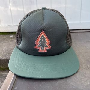 Green REI trucker hat. Great condition, worn once.